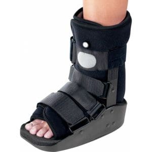 Donjoy MaxTrax Air Ankle Walker boot with Velcro straps for mobility support and injury recovery.