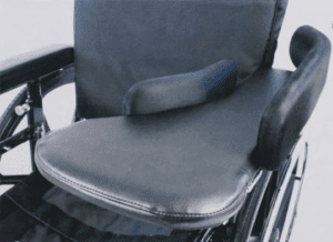 Wheelchair lateral support cushion, padded for stability and comfort, ideal for mobility support.