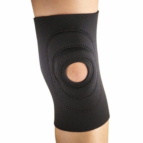 OTC neoprene knee support with stabilizer pad and open patella for mobility support.