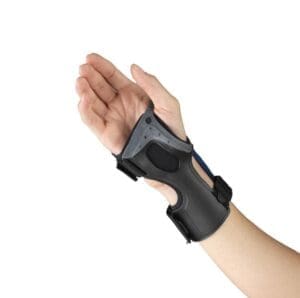 OTC Low-Profile Wrist Brace 2081 provides wrist support for home care and mobility use.