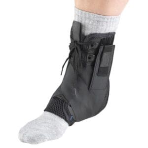 OTC Ankle Stabilizer Exoskeleton 2376 (lace-up) provides mobility support and injury recovery.