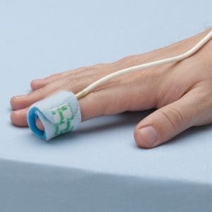 Posey Oximeter Probe Wraps 6554 on finger for home care oxygen monitoring, secure fit.