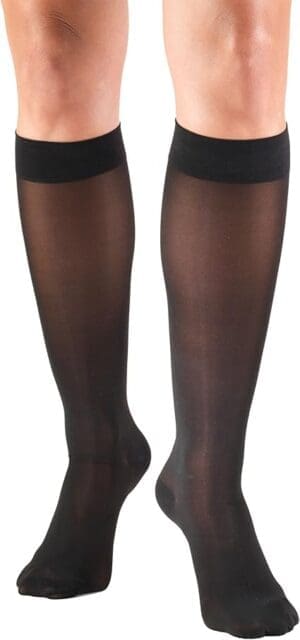 Truform 20-30 mmHg knee high compression stockings, black, for leg support and mobility aid.
