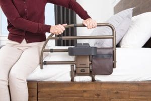 SignatureLife Freedom Click Extendable Bed Rail with organizer, mobility support for home care.