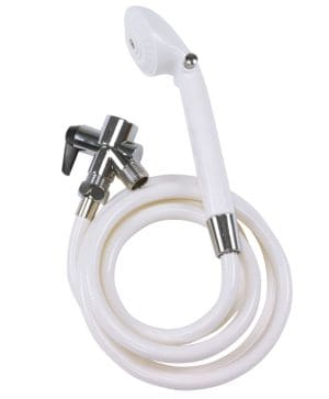 Handheld white bidet sprayer with hose for home care hygiene and assisted mobility needs.