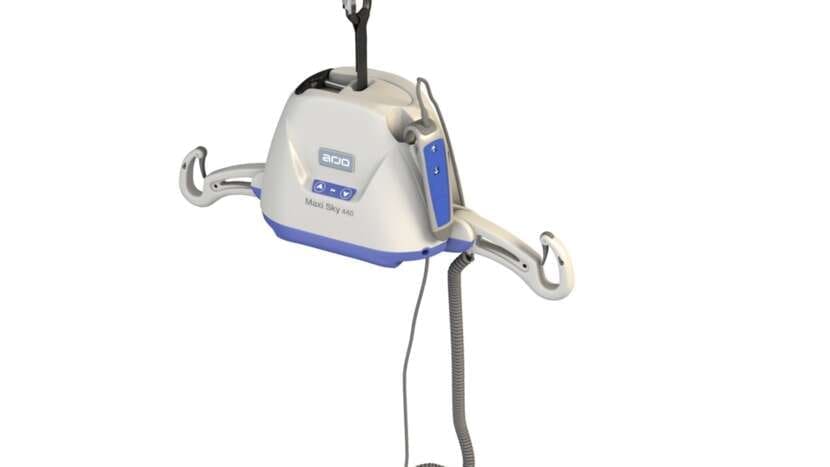 Arjo Maxi Sky 440 portable ceiling lift for patient transfer and mobility support in home care.