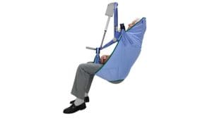 Arjo Clip Sling with padded, extended legs for patient transfer via mechanical lift in home care.