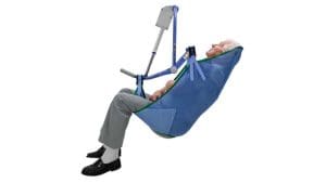 Arjo Clip Bathing Sling with padded legs on mechanical lift for home care mobility support.
