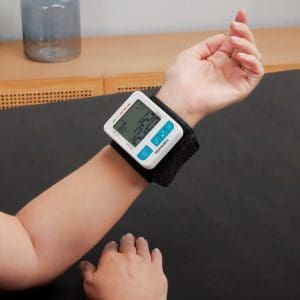 HoMedics Bluetooth Wrist Blood Pressure Monitor displaying readings, ideal for home health monitoring.