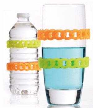 Silicone bottle gripper for mobility aid; non-slip, colorful bands enhance home care use.