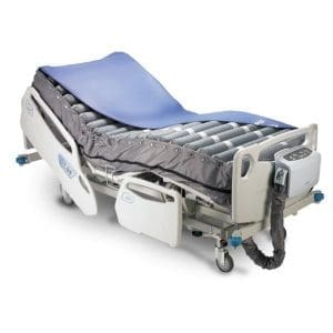Permobil Serene Air alternating pressure hospital bed with inflatable mattress for home care.