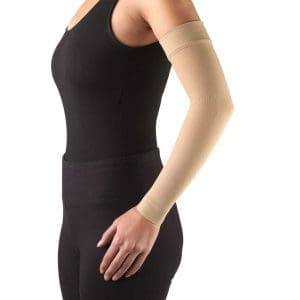 Truform 3315 compression sleeve on left arm; supports home care, swelling, or lymphedema.
